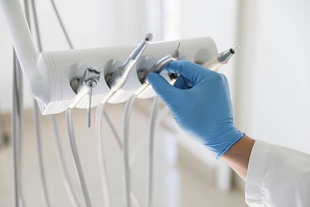 Professional Tooth Extraction technician working in Benton County County, IN